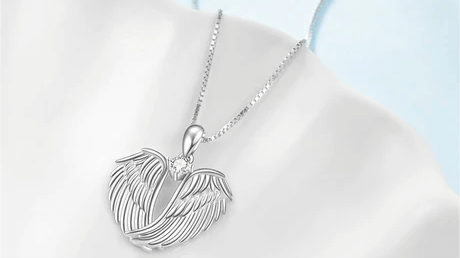 The Mesmeric Feather Pendant Necklace: Elevate Your Style with a Dash of Wit