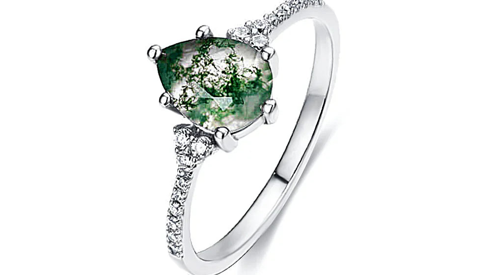 Kaitlan Collins' Husband Will Douglas: A Look into the Stylish Couple's Love for Fashion and Moss Agate Rings