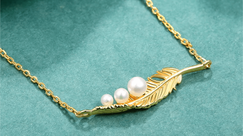 Unleash Your Quirky Charm with Gold Feather Necklace