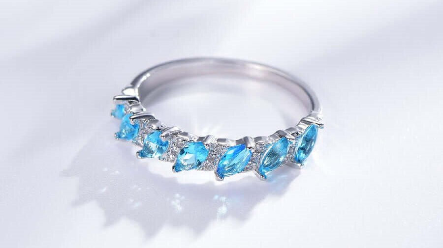 How Sterling Silver Band Rings with Blue Became a Symbol of Modern Romance