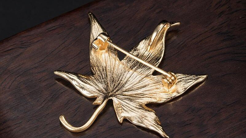 Why are pin brooches making a comeback?